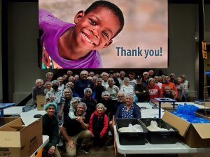 Picture of people at Feed My Starving Children event